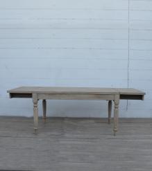 EXTENDABLE SOLID WOOD DINING TABLE W/ SELF-STORING EXTENSIONS
