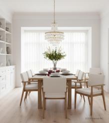 EXTENDABLE SOLID WOOD DINING TABLE W/ SELF-STORING EXTENSIONS