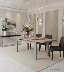 EXTENDABLE SOLID WOOD DINING TABLE W/ SELF-STORING EXTENSIONS