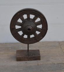 SOLID WOOD WHEEL MOUNTED ON STAND 