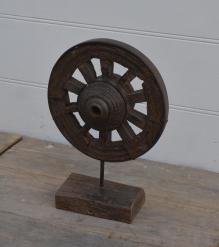 SOLID WOOD WHEEL MOUNTED ON STAND 