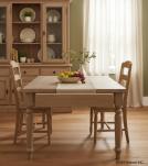 EXTENDABLE SOLID WOOD DINING TABLE W/ SELF-STORING EXTENSIONS