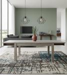 EXTENDABLE SOLID WOOD DINING TABLE W/ SELF-STORING EXTENSIONS