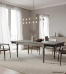 EXTENDABLE SOLID WOOD DINING TABLE W/ SELF-STORING EXTENSIONS