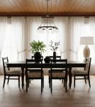 EXTENDABLE SOLID WOOD DINING TABLE W/ SELF-STORING EXTENSIONS