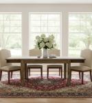 EXTENDABLE SOLID WOOD DINING TABLE W/ SELF-STORING EXTENSIONS