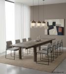 EXTENDABLE SOLID WOOD DINING TABLE W/ SELF-STORING EXTENSIONS