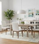 EXTENDABLE SOLID WOOD DINING TABLE W/ SELF-STORING EXTENSIONS