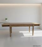 EXTENDABLE SOLID WOOD DINING TABLE W/ SELF-STORING EXTENSIONS