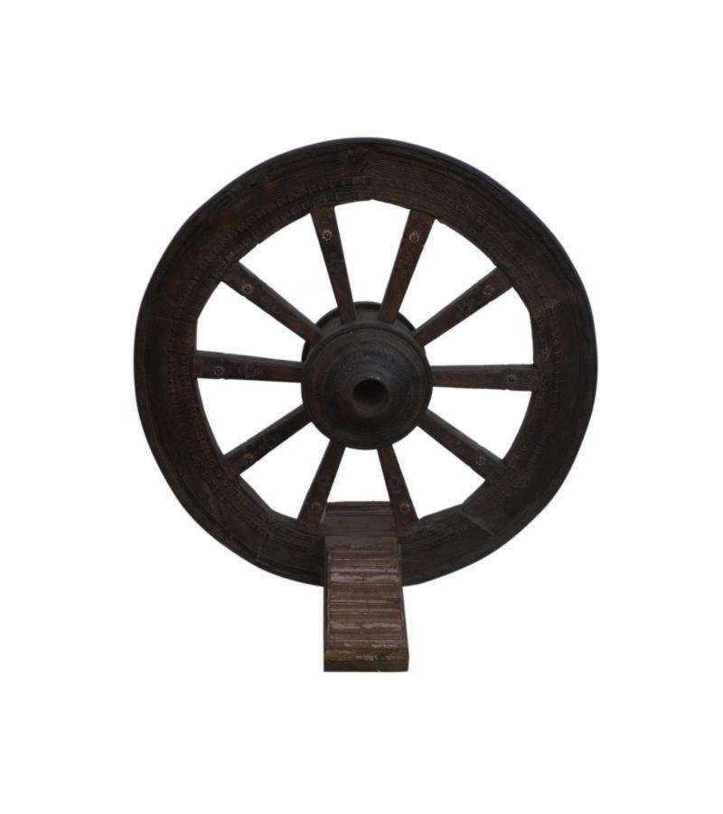 WOODEN WHEEL ON STAND