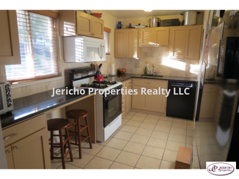 4895 Beach Court, Denver, CO 80221 Jericho Properties Realty LLC