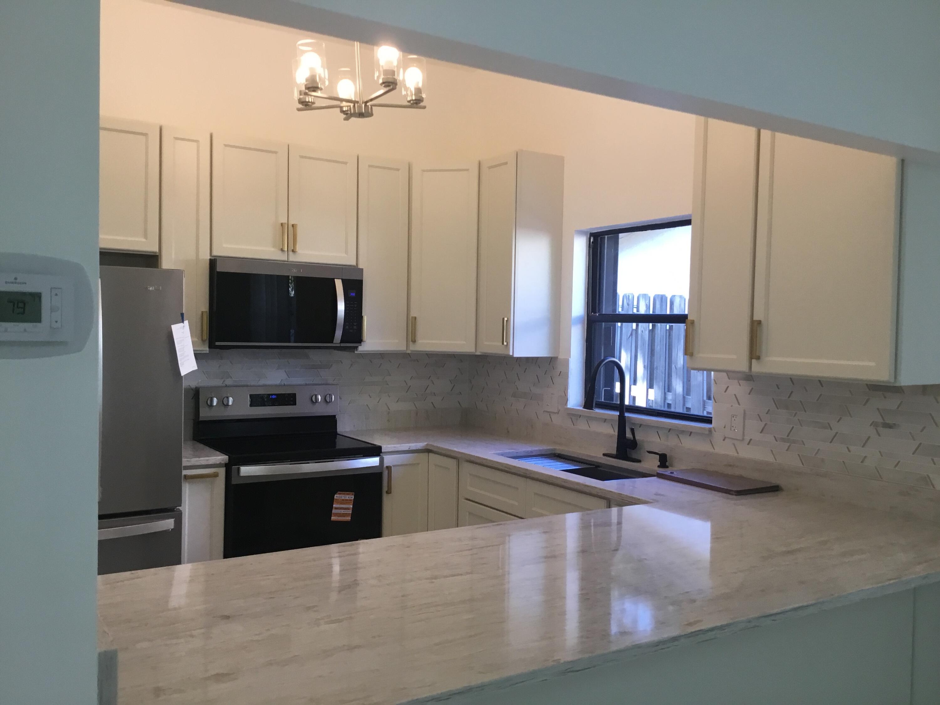 Palm Beach Gardens Condo: 1094 Raintree Court