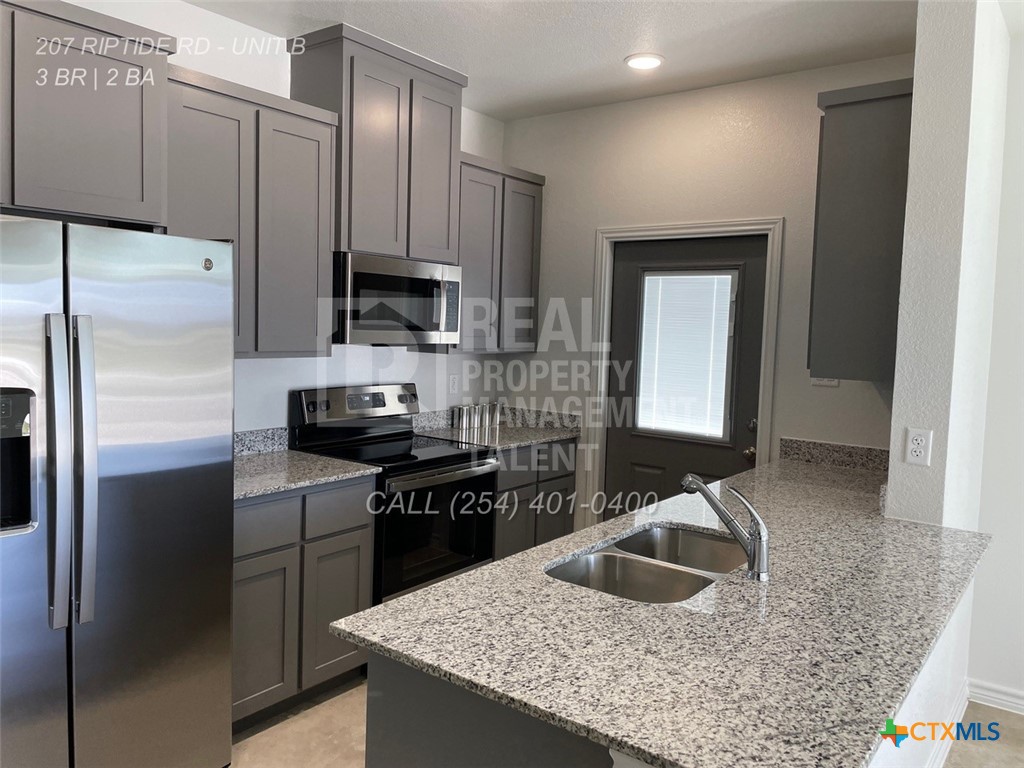 Temple Condo: 207 Riptide Road