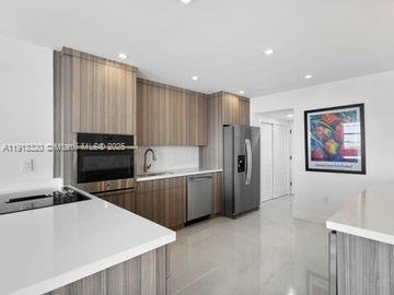 Miami Beach Condo: 5825 Collins Avenue