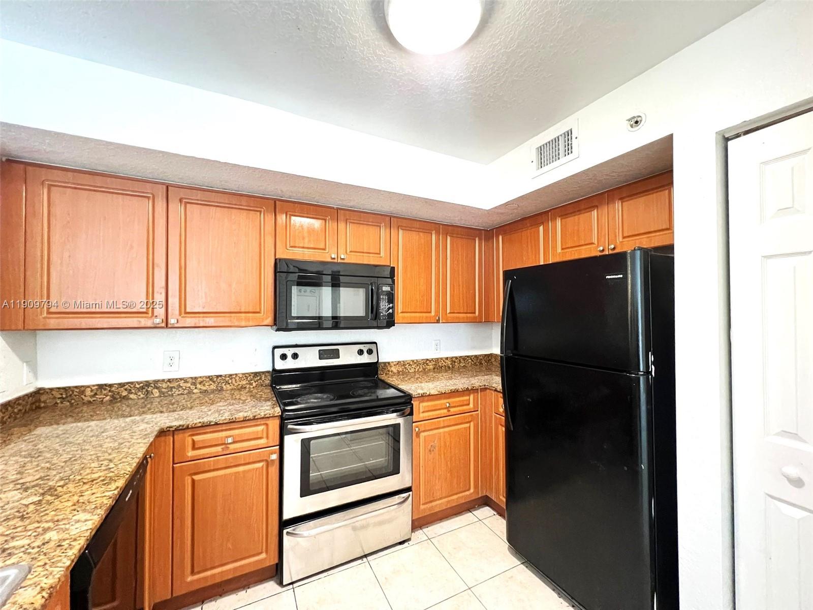 North Miami Condo: 13820 Northeast 3rd Court