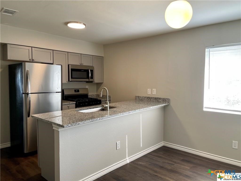 San Marcos Condo: 1108 Hazelton St