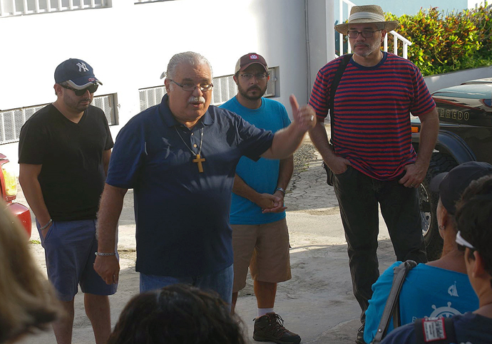 Bishop Hector Ortiz speaks to members of the Methodist Outreach Brigade, who distributed food and water in the central area of Puerto Rico after Hurricane Maria struck the island in September of 2017. Photo by the Rev. Gustavo Vasquez, UMNS.