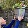 Revolutionary 4-in-1 Self-Watering Fence Planter and Solar Light - Forest Green