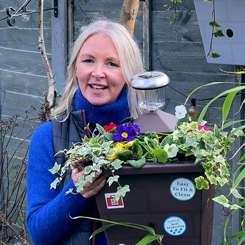 Revolutionary 4-in-1 Self-Watering Fence Planter and Solar Light Revolutionary 4-in-1 Self-Watering Fence Planter and Solar Light