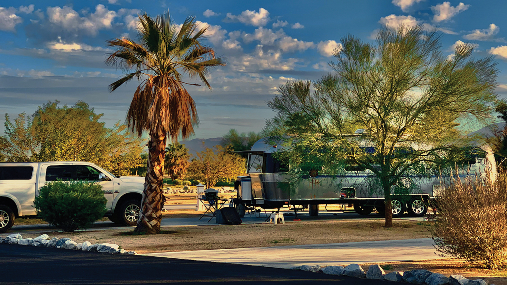 Airstream-Living-in-Beauty-Feature-Image|Airstream-Living-in-Beauty-Preview-Image|Airstream-Living-in-Beauty|Airstream-Living-in-Beauty-Baskets-2|Airstream-Living-in-Beauty-Baskets|Airstream-Living-in-Beauty-Police-Car|Airstream-Living-in-Beauty-Baskets-3|Airstream-Living-in-Beauty-Beach|Airstream-Living-in-Beauty-Desert|Airstream-Living-in-Beauty-Mountains|Airstream-Living-in-Beauty-on-the-beach|Airstream-Living-in-Beauty-Sunset|Airstream-Living-in-Beauty-Having-a-Drink|Airstream-Living-in-Beauty-At-House