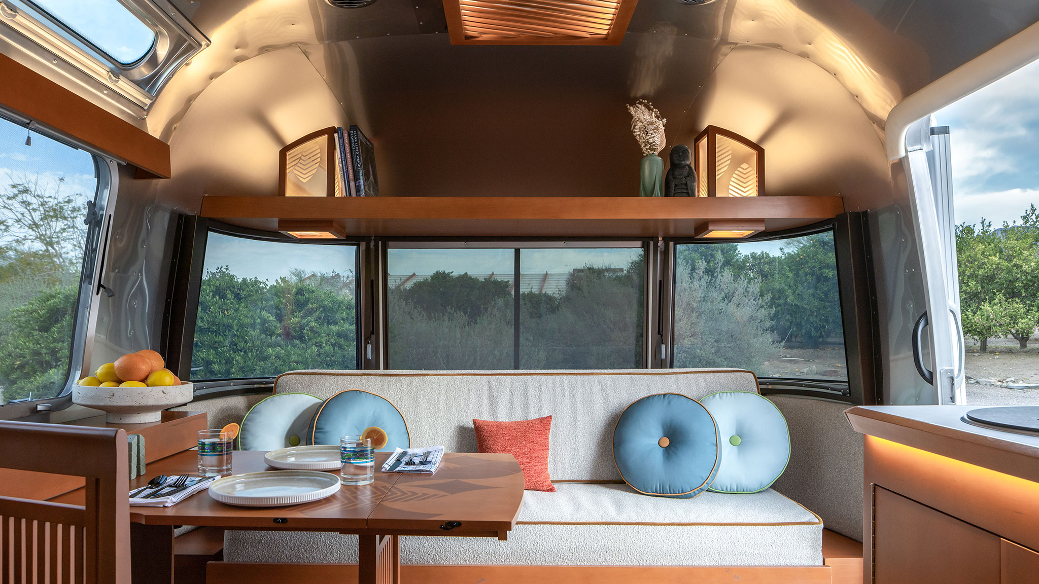 airstream-frank-lloyd-wright-usonian-limited-edition-blog-bannerjpg|AIR MKT FLW 2025 Folding Dinette Hot Spot|airstream-frank-lloyd-wright-usonian-limited-edition-blog-preview|Andrew Pielage Photography|Andrew Pielage Photography|Andrew Pielage Photography|Frank Lloyd Wright mobile kitchen design|airstream-frank-lloyd-wright-usonian-limited-edition-convertibility-in-primary-sleeping-area|Andrew Pielage Photography|airstream-frank-lloyd-wright-usonian-limited-edition-kentuck-knob-usonian-convertibility|Andrew Pielage Photography|Eugene "Gene" Masselink working on a mural in Frank Lloyd Wright's Taliesin West's office, April 1960 From the John Amarantides papers, Frank Lloyd Wright Foundation Collection Eugene "Gene" Masselink working on a mural in Frank Lloyd Wright's Taliesin West's office, April 1960 Eugene "Gene" Masselink working on a mural in Frank Lloyd Wright's Taliesin West's office, April 1960. 1910.629.1-6. The mural from the TAA designed Lewis and Roca law firm in Phoenix. From the John Amarantides papers, Frank Lloyd Wright Foundation Collection|Andrew Pielage Photography|airstream-frank-lloyd-wright-usonian-limited-edition-gordon-leaf-pattern-collage|AIRMKT 2025 FLW 28RB Logo PRINT.tif-2|Andrew Pielage Photography|airstream-frank-lloyd-wright-usonian-limited-edition-badge 1|Andrew Pielage Photography|Andrew Pielage Photography|airstream-frank-lloyd-wright-usonian-limited-edition-slatted ceiling fixture|airstream-frank-lloyd-wright-usonian-limited-edition-wally-byam-and-frank-lloyd-wright