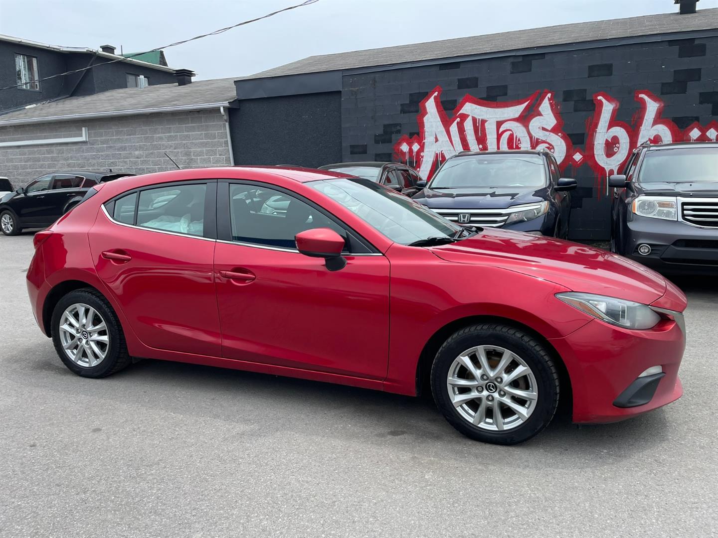 Red 2016 Mazda MAZDA3 i Touring Hatchback Hatchback Manual
