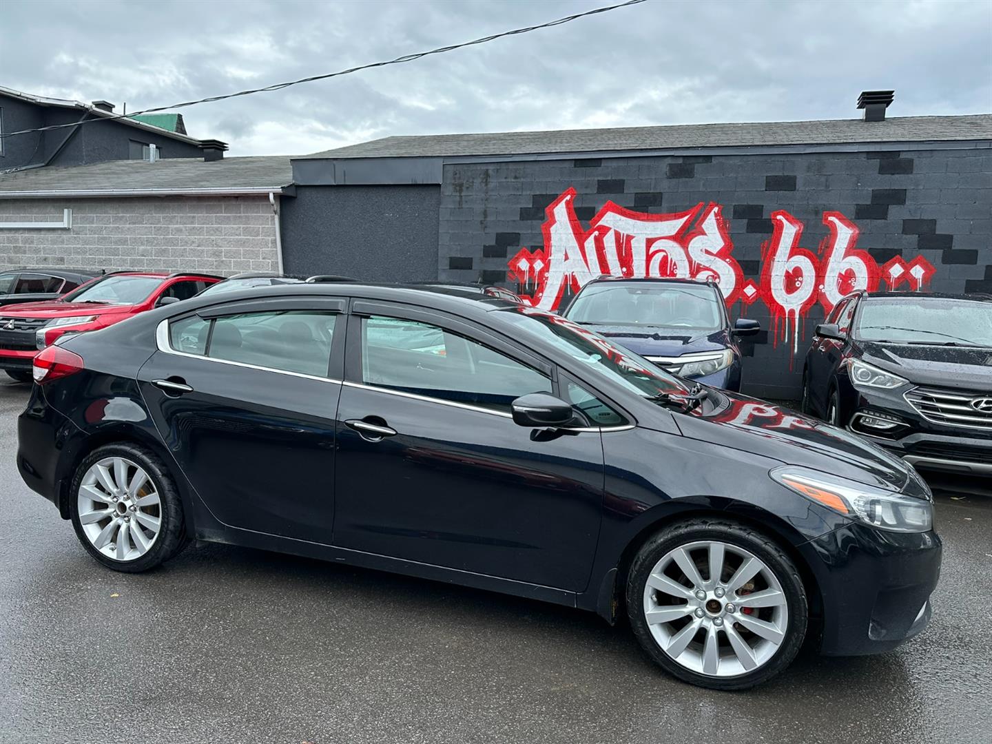 Black 2018 Kia Forte Sedan Front-Wheel Drive Automatic