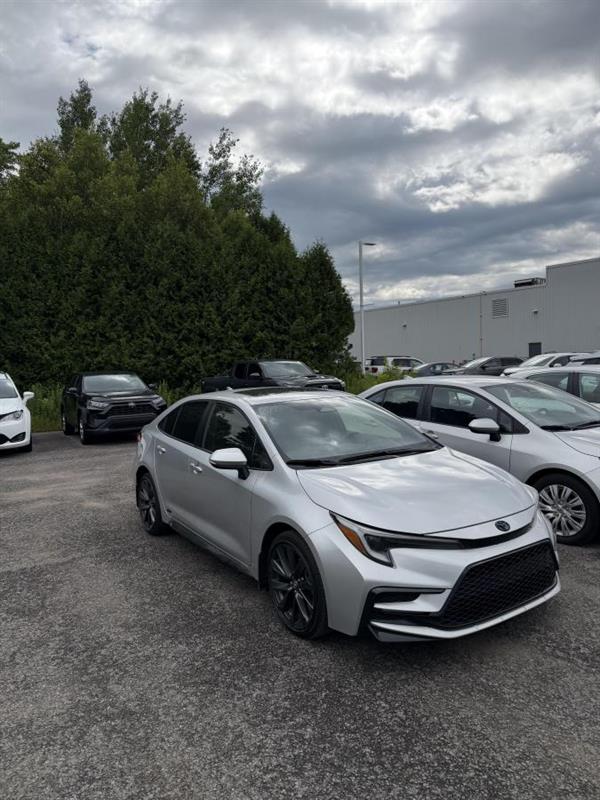 Silver 2024 Toyota Corolla Hybrid Sedan All-Wheel Drive Continuously Variable Transmission