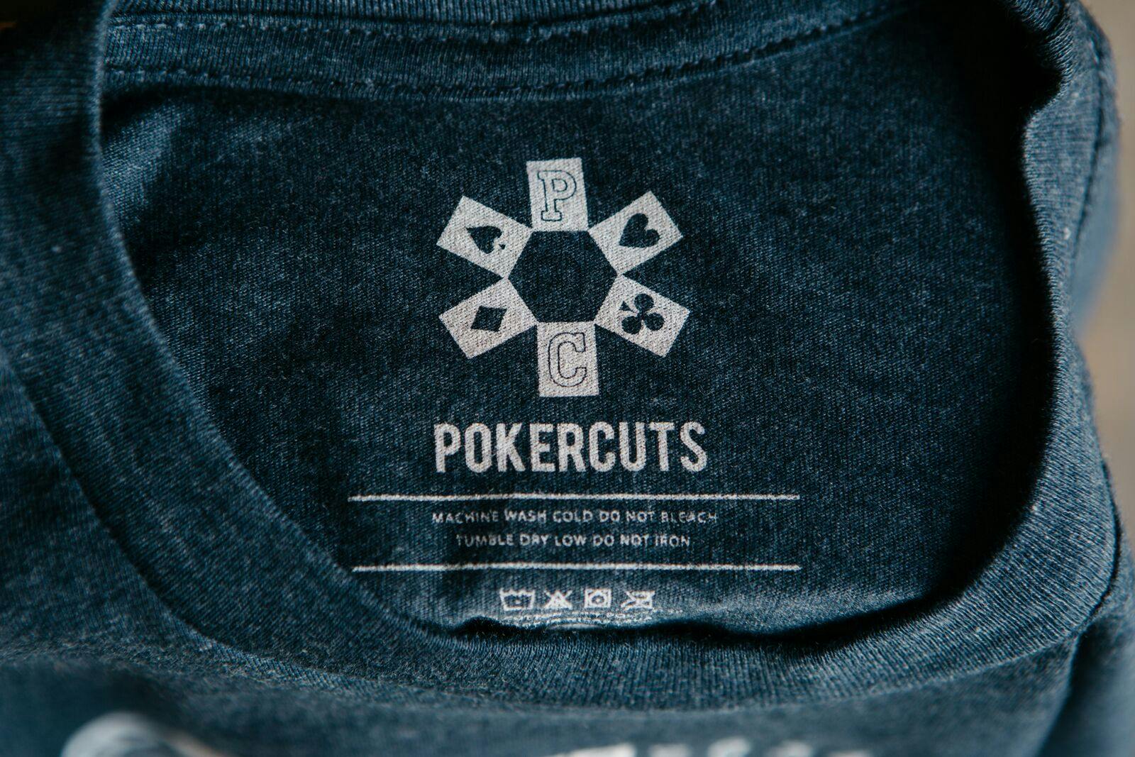 navy shirt with a close up of a printed tag