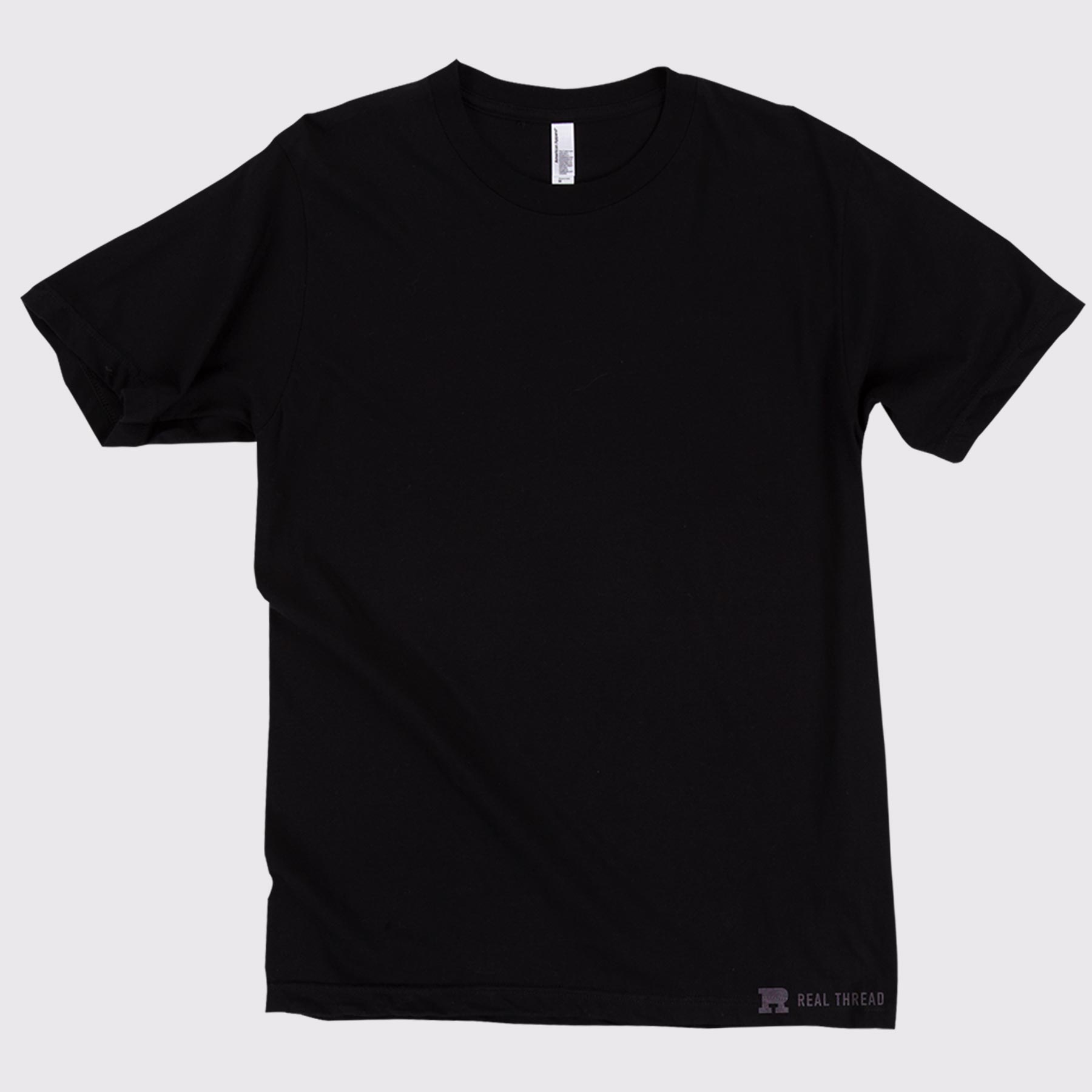 black t-shirt laying flat