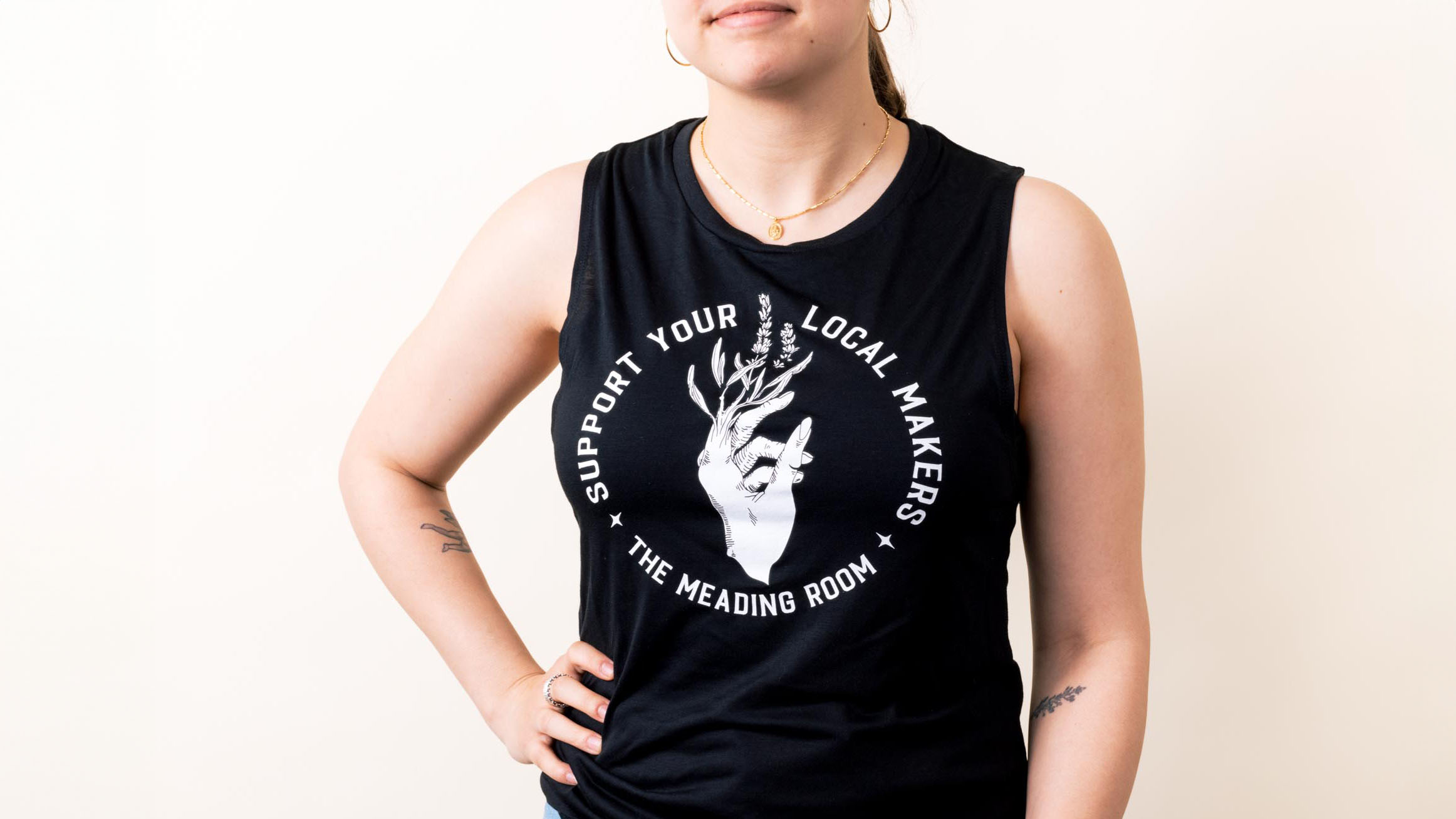 woman wearing a black tank top