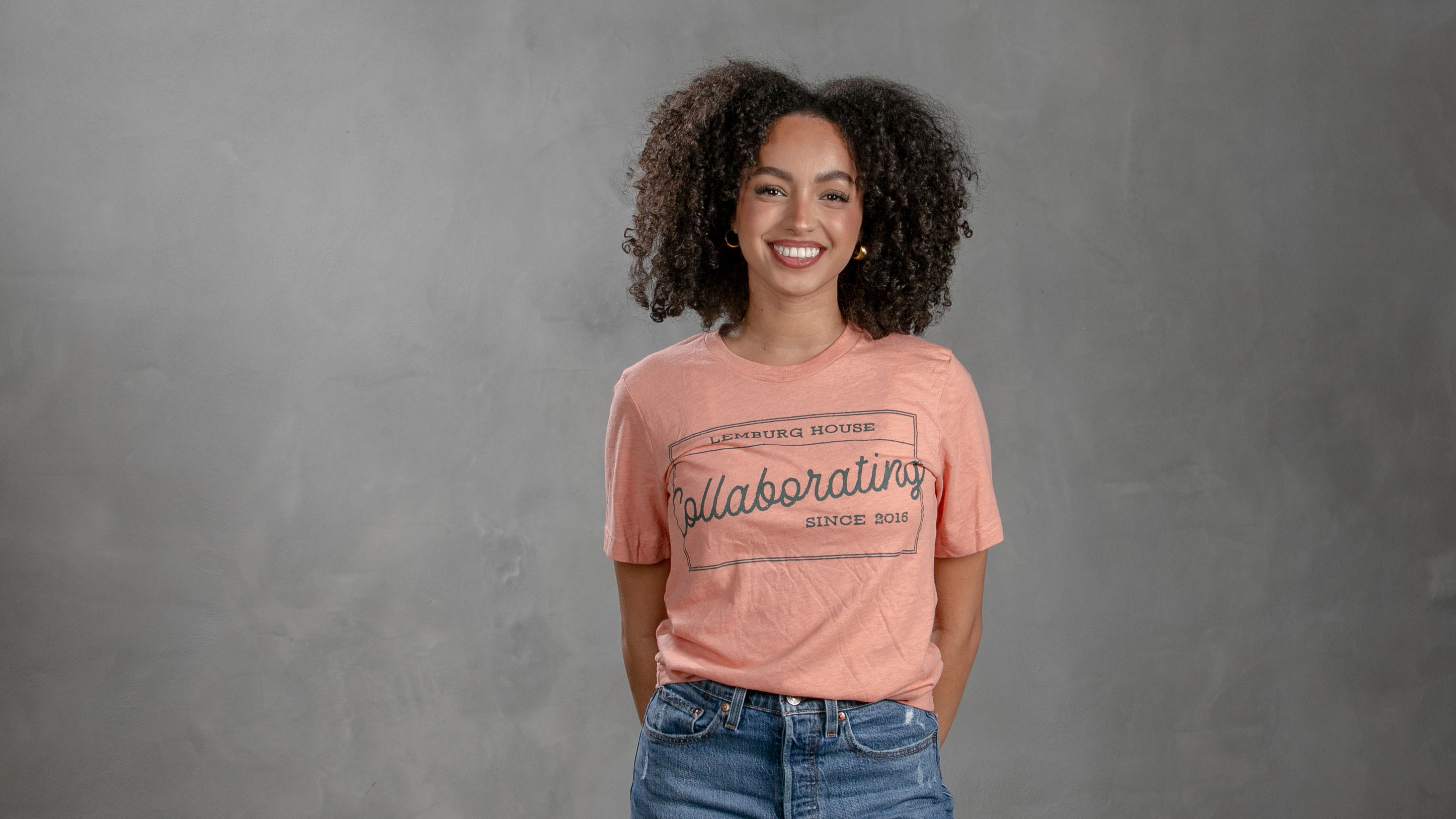 women wearing a peach color t-shirt