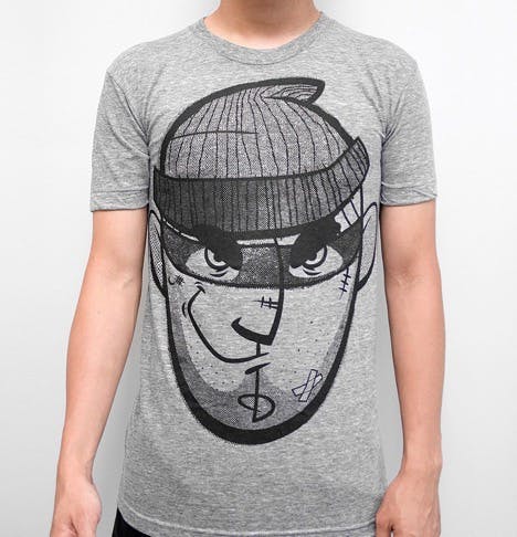 gray t-shirt with a face printed on it
