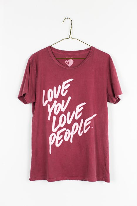 red t-shirt with love you love people printed on it
