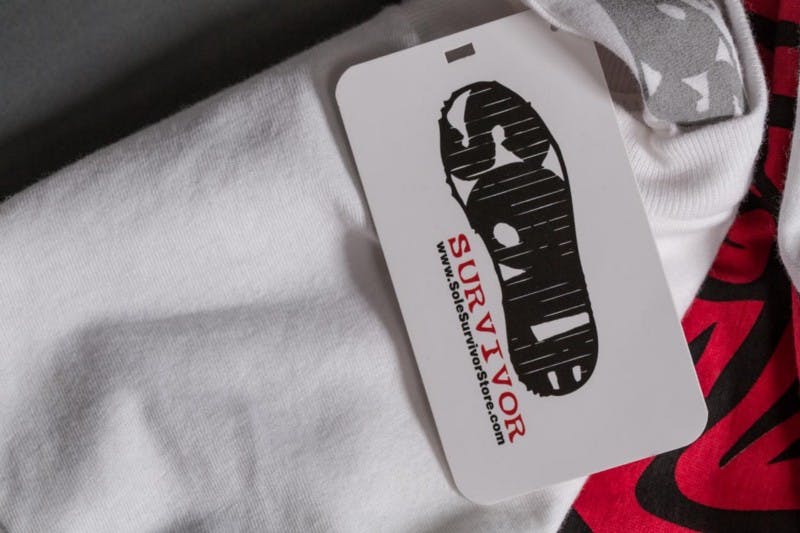 white hang tag on white shirt