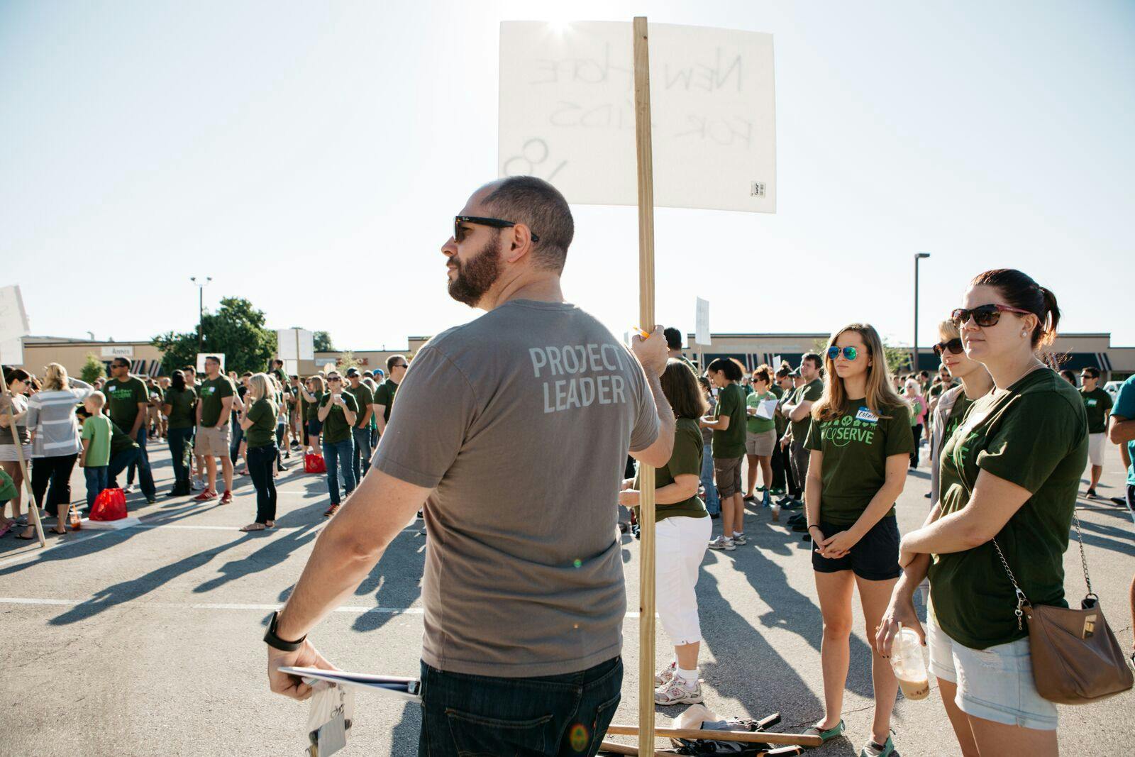 people outside at a rally