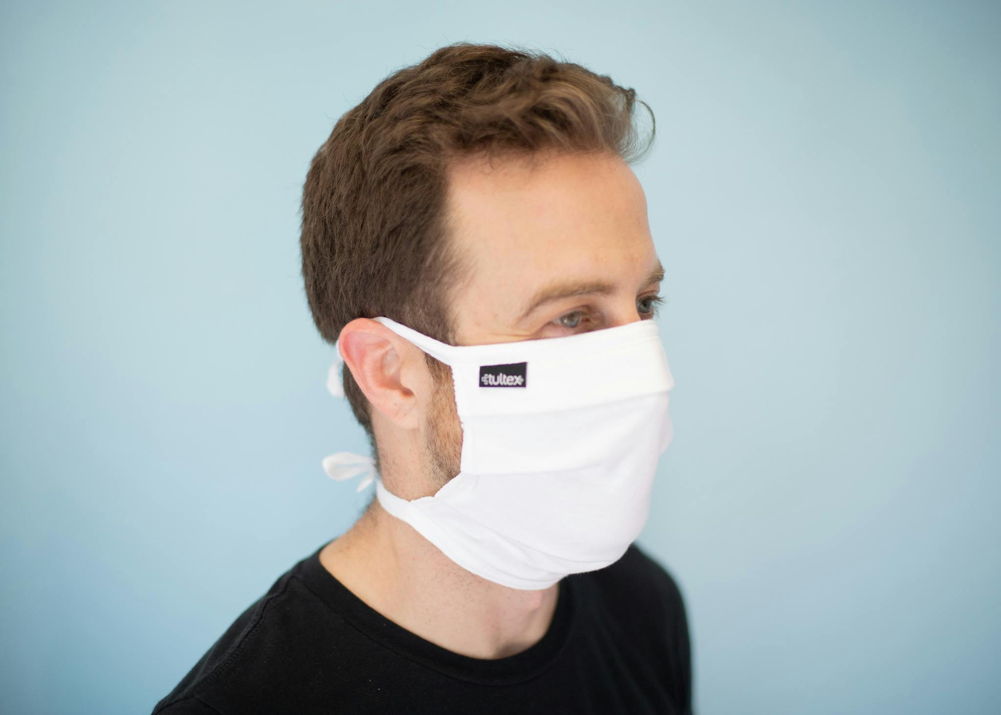 mark wearing white mask