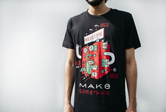 man wearing black shirt with front red graphic 