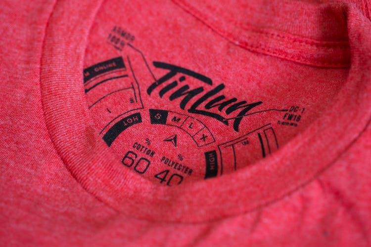 printed tag in a red shirt