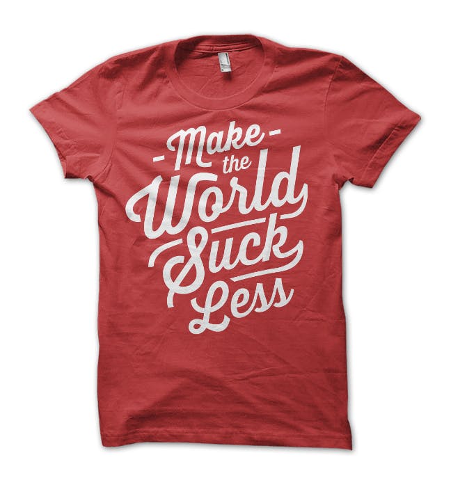 red shirt with make the world suck less printed on it