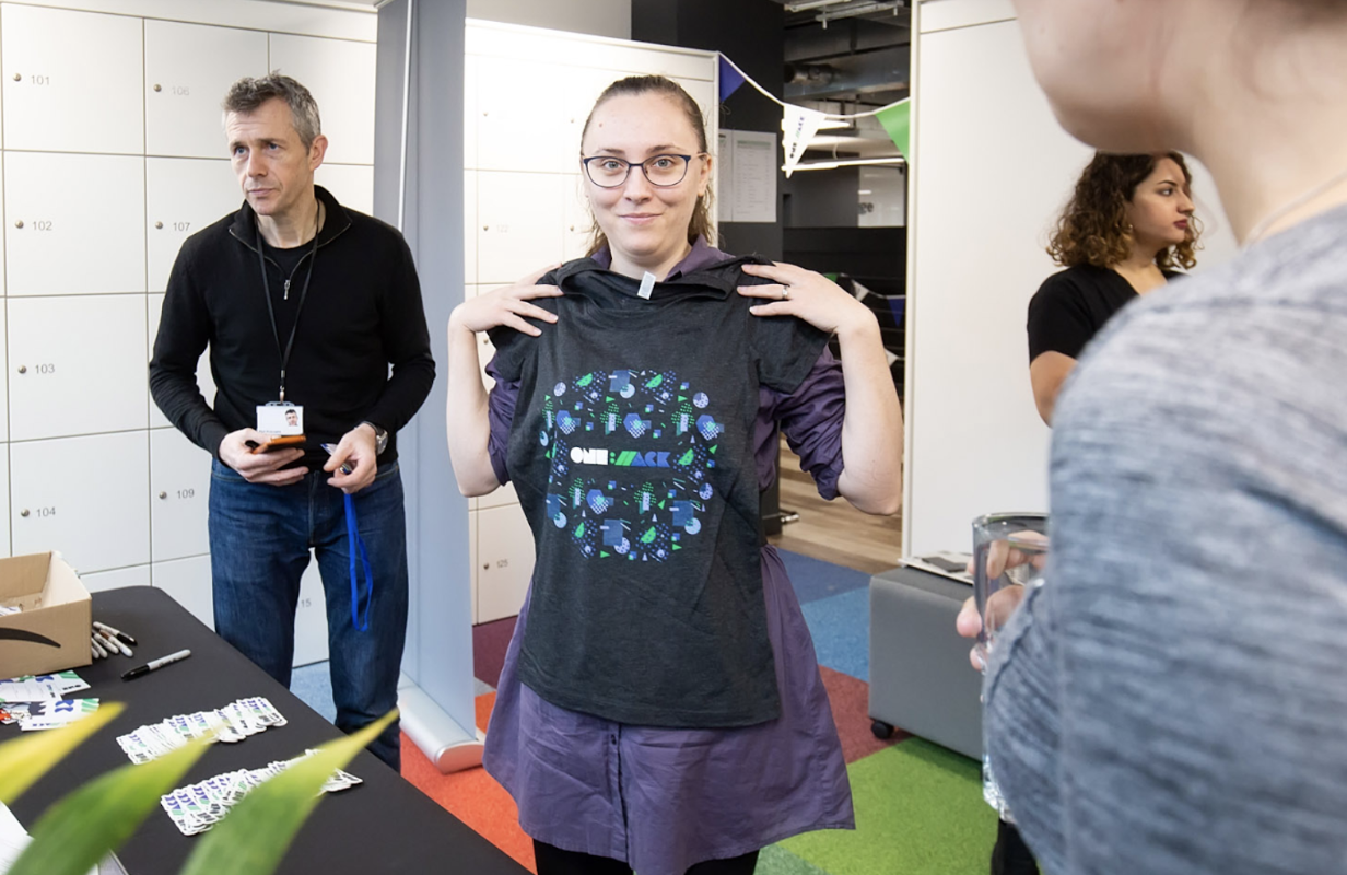 Showing off OneHack T-shirt