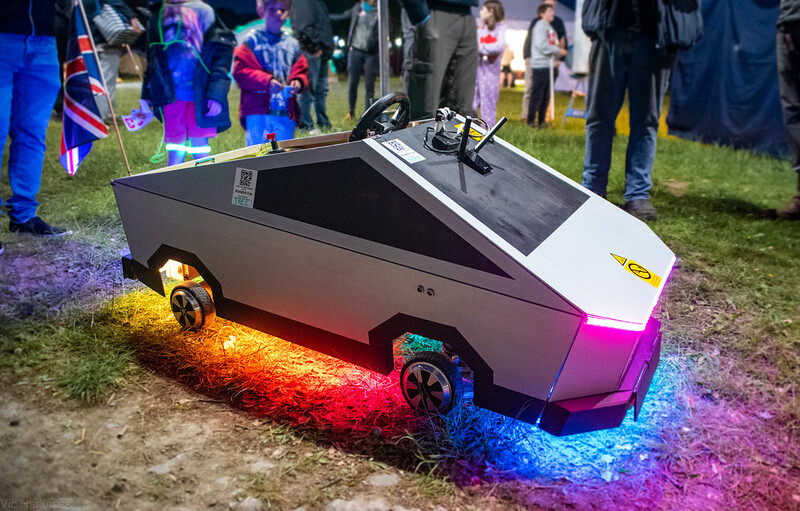 The Roamer, photographed at dusk with RGB underglow lighting.