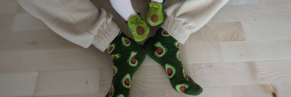 Mom and daughter wearing avocado socks