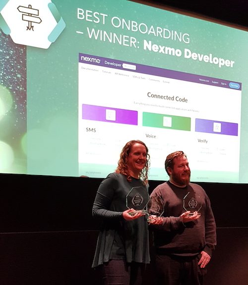 Martyn and Lorna accepting the award for best onboarding winner: Nexmo Developer