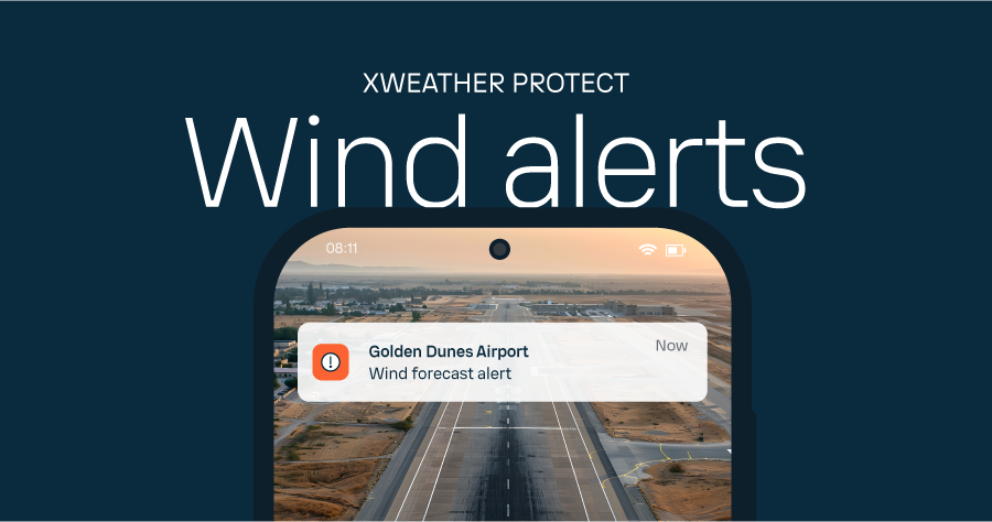 Mobile phone showing a wind forecast alert for an airport