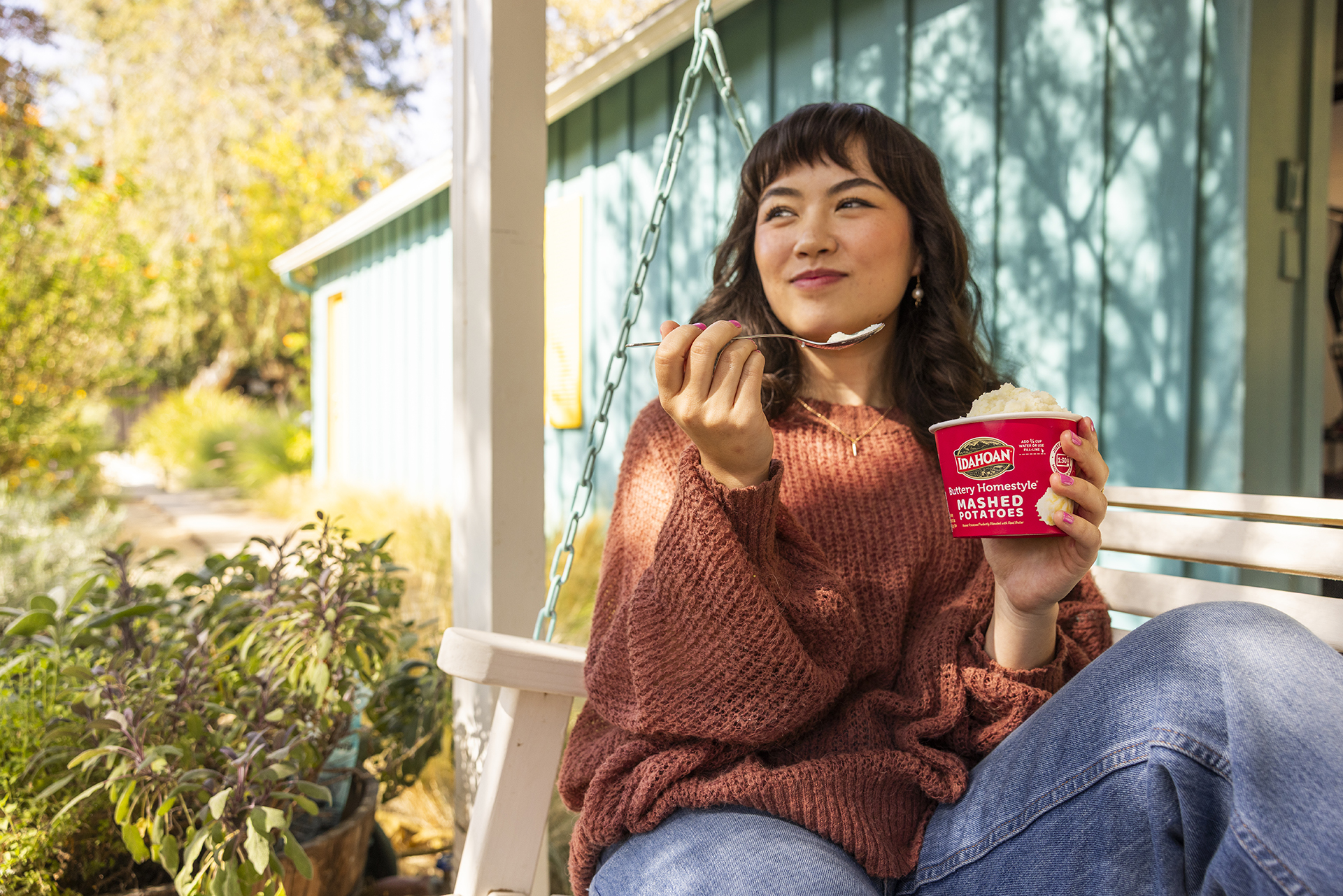Woman enjoying Idahoan On-The-Go Cup