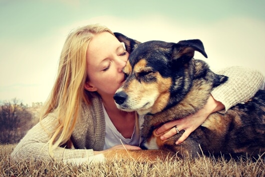 dog-mom-kissing-shepherd