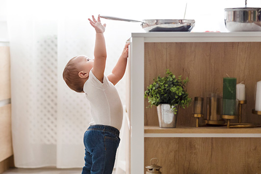 toddler reaching up
