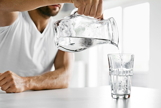 Man Pours Water To Stay Hydrated