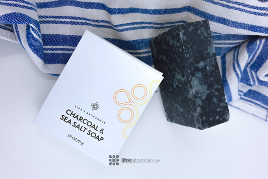 charcoal soap on blue towel